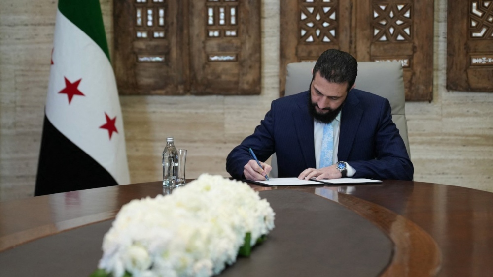 Syria's leader agrees truce deal with Kurds after govt troops advance